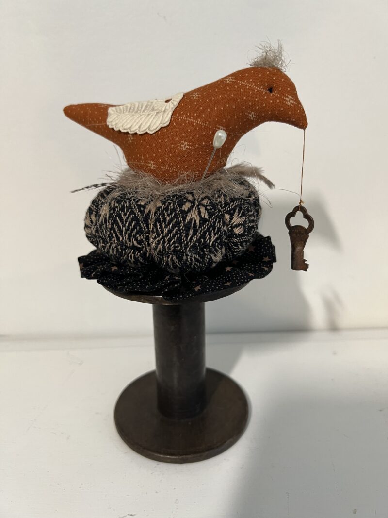 Rust calico bird